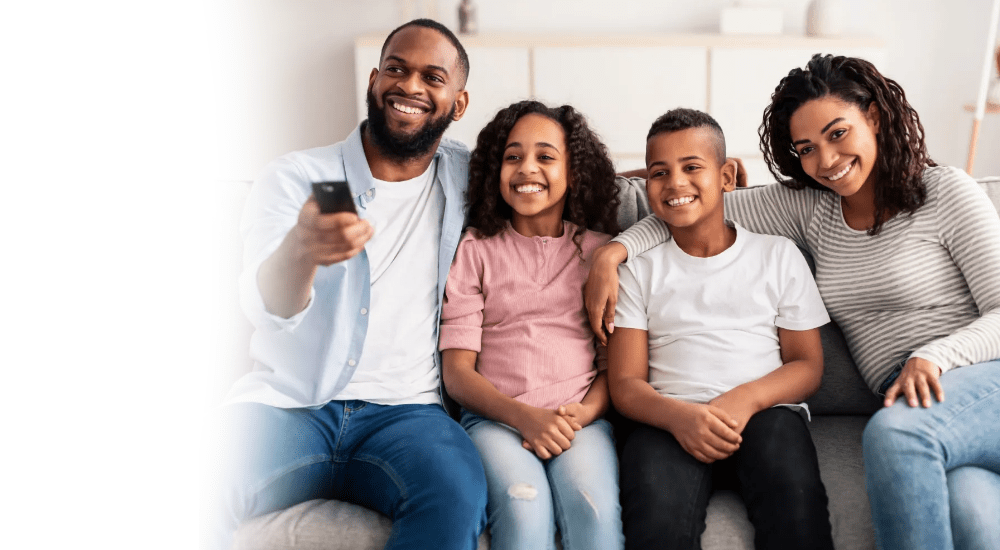 A family streaming their favourite show connected to their Telkom Uncapped LTE connection