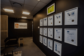 A wall full of accolades at DSL Telecom's office