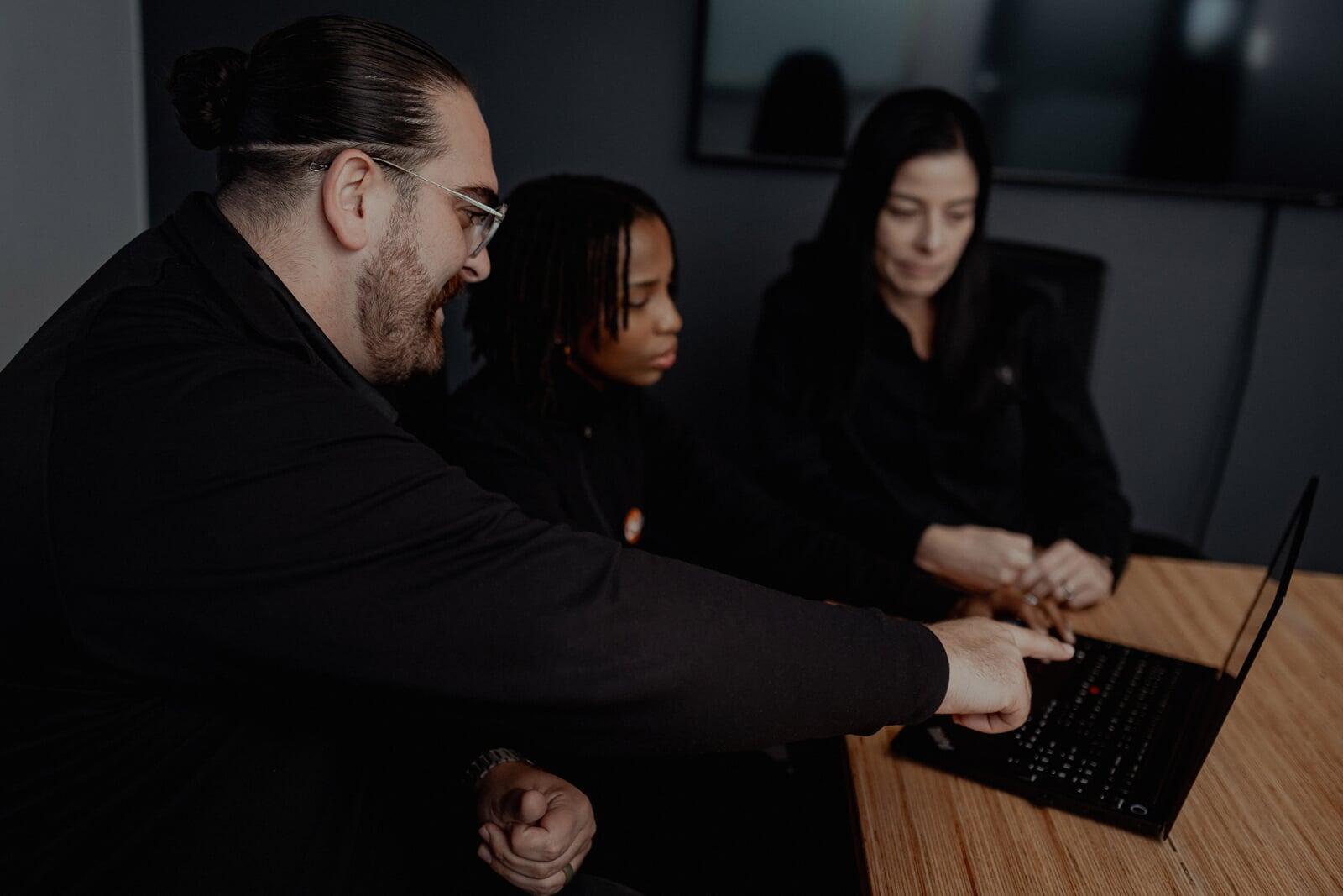 DSL Telecom employee assisting a client with cloud PBX service and VoIP solutions.