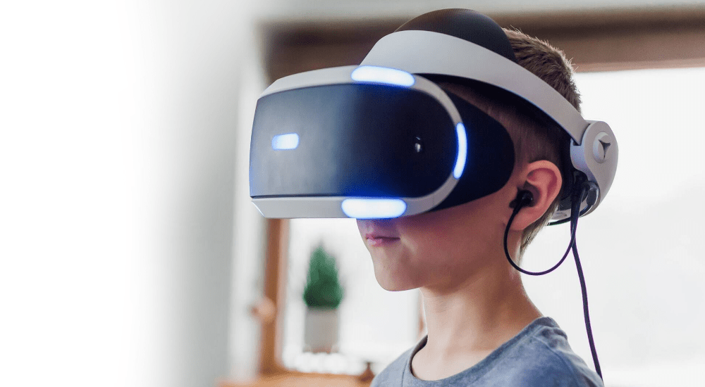 A young boy enjoying a virtual reality experience using 5G internet