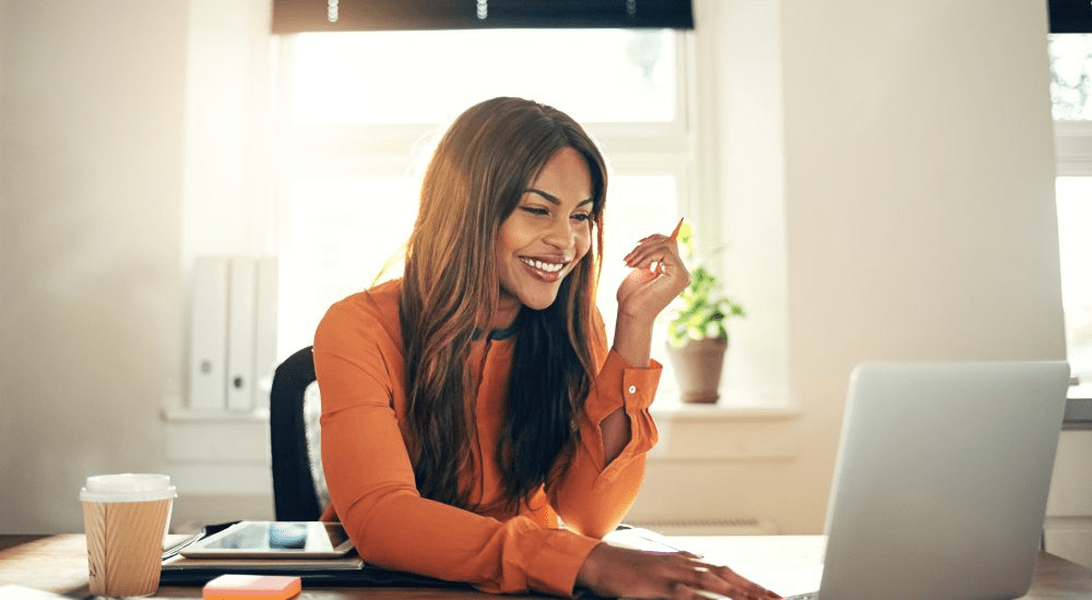 A business woman working on a laptop with a high-speed internet