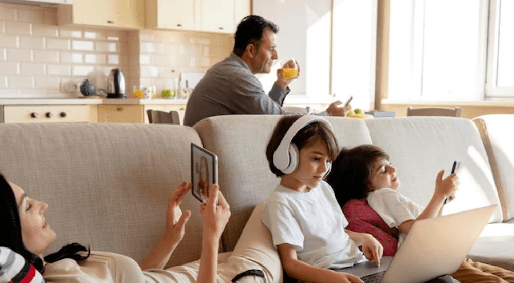 A family connecting to their fibre internet using multiple devices