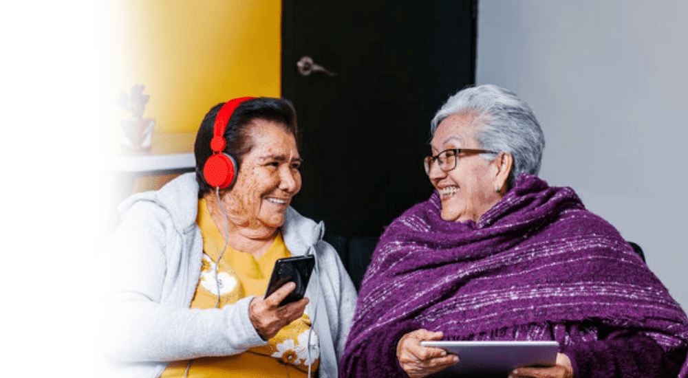 Two ladies streaming with a stable Vox Vuma uncapped fibre internet connection