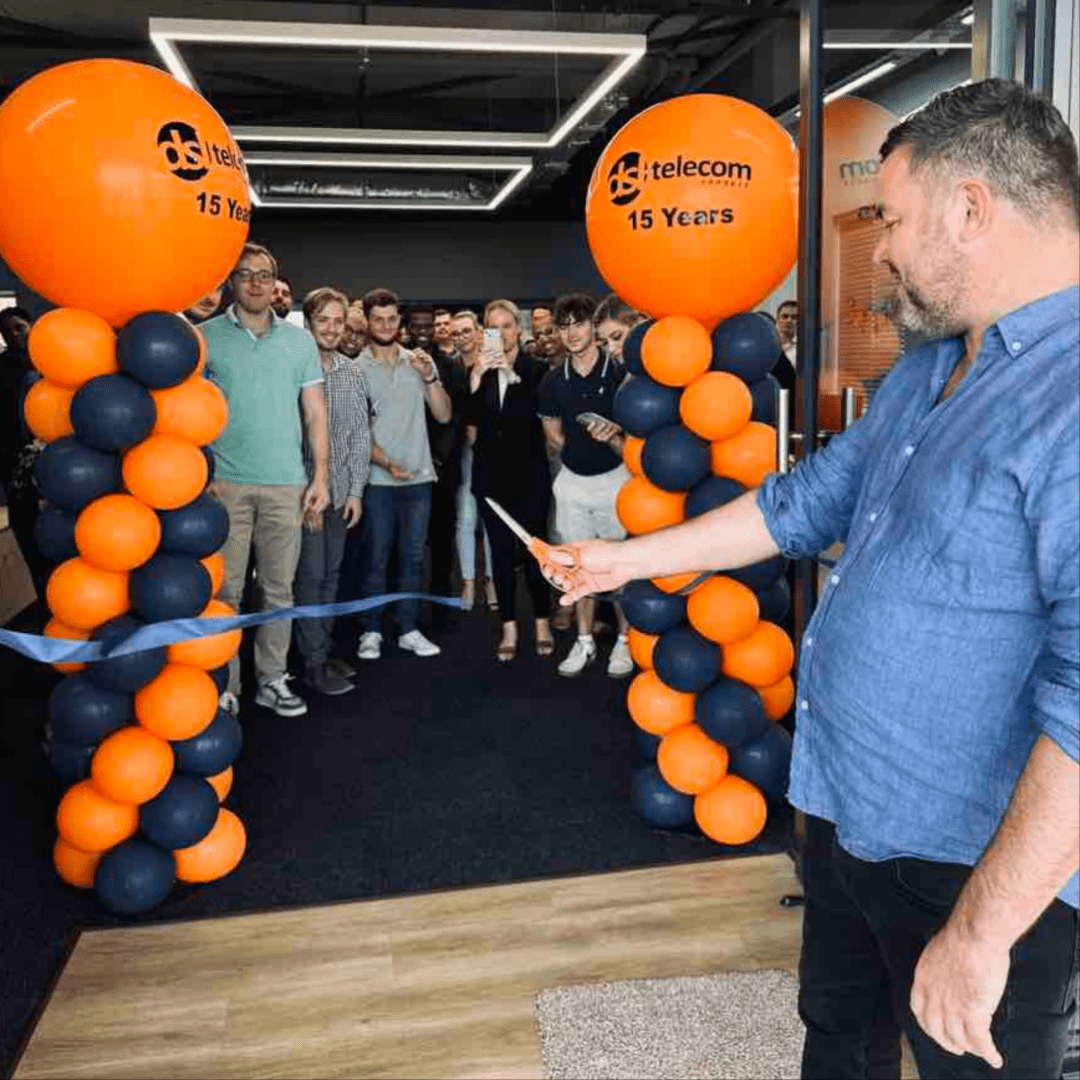DSL Telecom's Managing Director cutting the ribbon at our new secondary office space