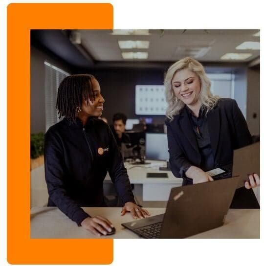 DSL Telecom employees collaborating in the office, showing teamwork and career opportunities in Somerset West