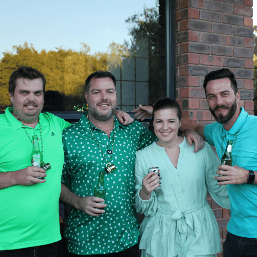 DSL Telecom team members enjoying an Irish-themed spit braai event