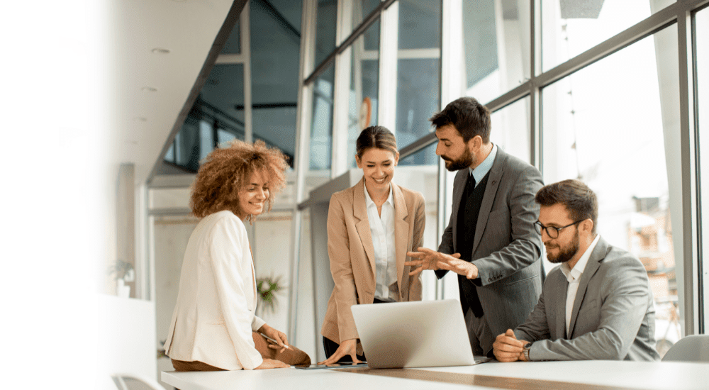 Team of people working in an office on Liquid Intelligent Technologies business fibre