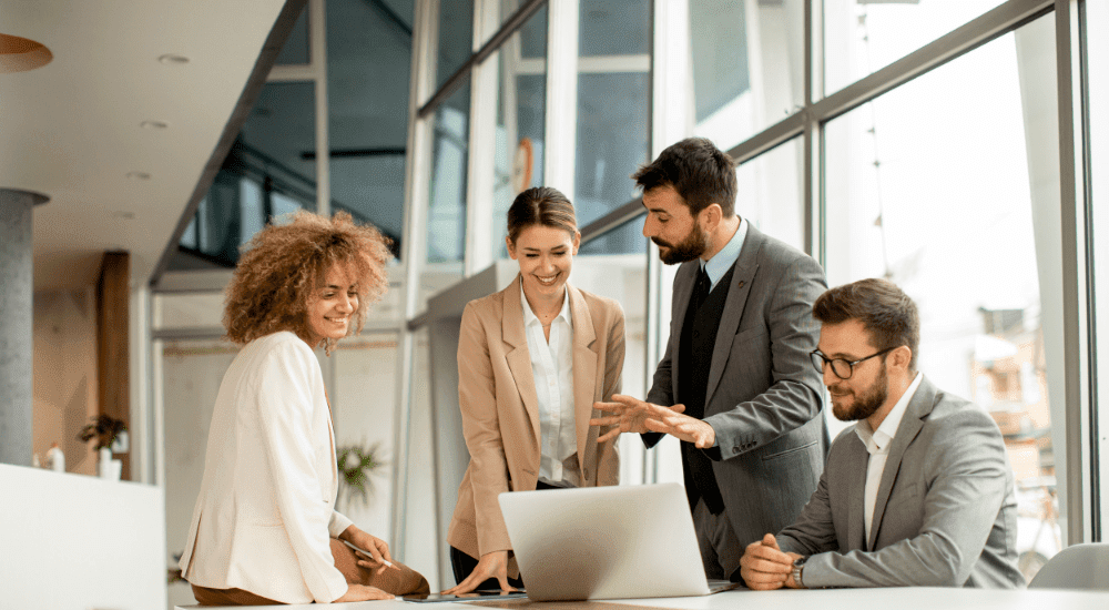 Team of people working in an office on Liquid Intelligent Technologies business fibre