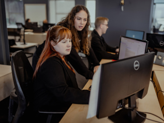 r Direct mentorship in action at DSL Telecom's Helderberg internship programme.