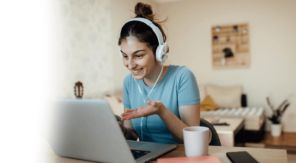 A young women on a video call using her Telkom Metrofibre internet connection