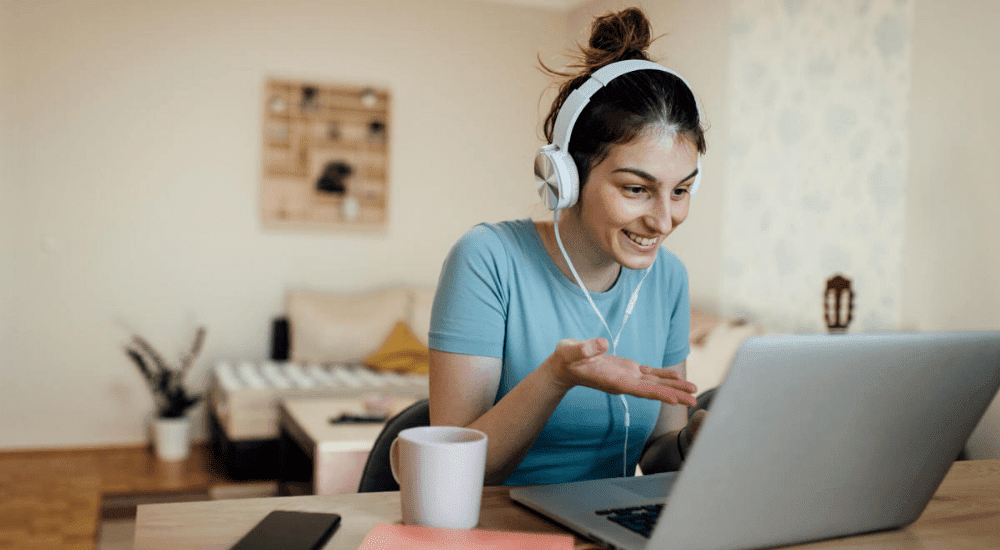 A young women on a video call using her Telkom Metrofibre internet connection