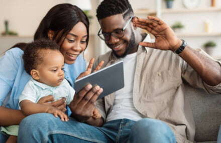 Family relaxing at home using a fast and stable Telkom Metrofibre internet connection for seamless streaming.