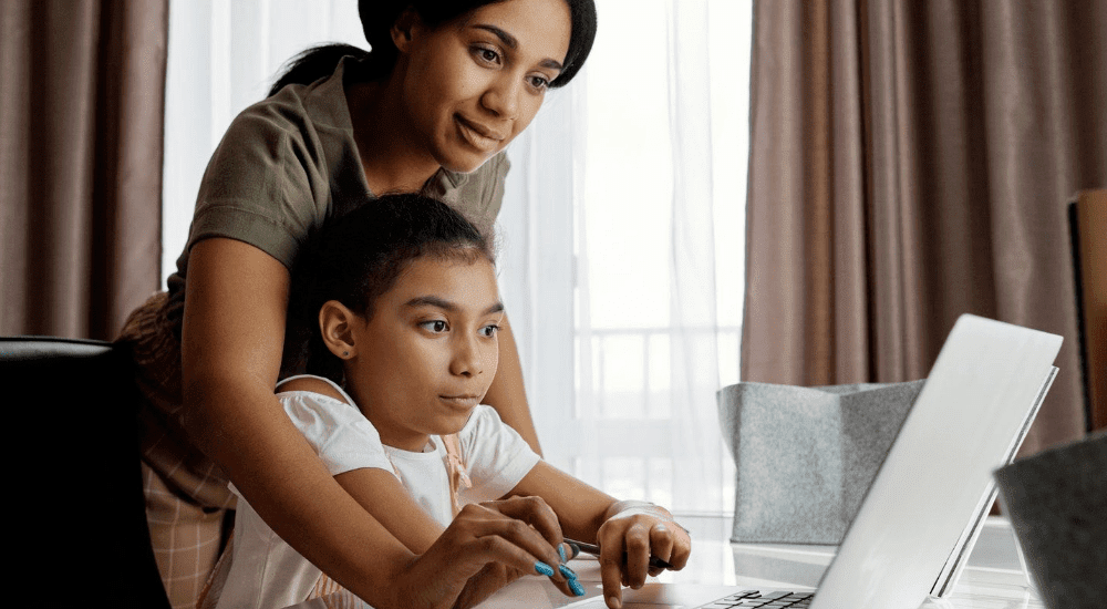 A woman and her daughter on a video call connected to high-speed fibre