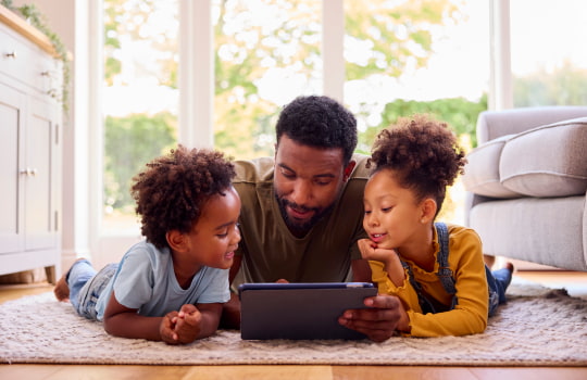 Family watching cartoons on a tablet with stable 10Mbps Telkom uncapped LTE service in Somerset West