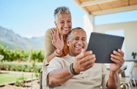 Older couple FaceTiming their family over Vox Openserve’s dependable fibre network