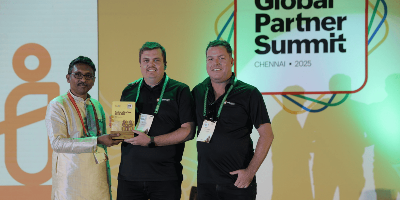 An image of Paul and Dean receiving DSL Telecom's Partner Of The Year award from Hyther Nizam