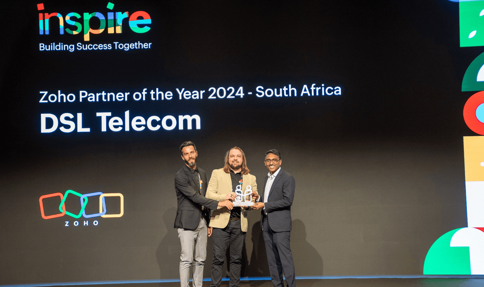 Tremayne and Hansie receiving DSL Telecom's Partner Of The Year award from Hyther Nizam