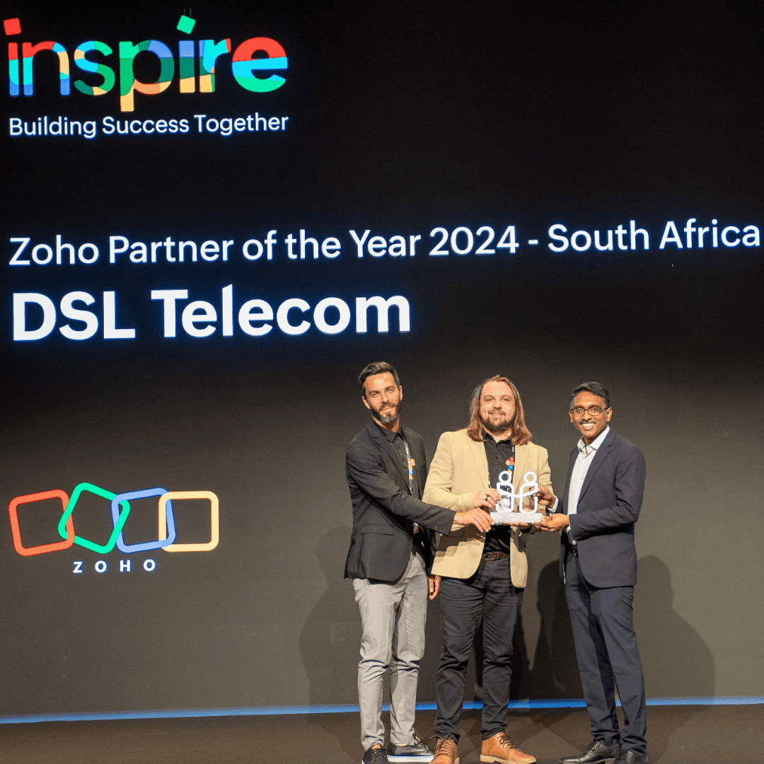 Tremayne and Hansie from DSL Telecom accepting the Partner Of The Year award at the Zoho Inspire Event