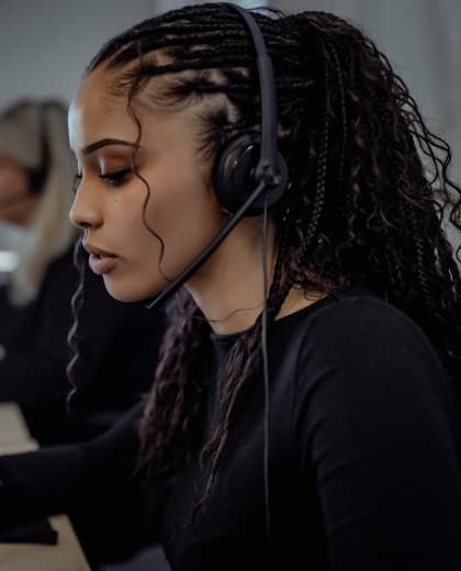 DSL Telecom employee assisting a client with cloud PBX service and VoIP solutions.