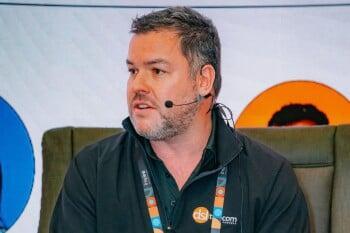 Dean Schreuder from DSL Telecom speaking on stage at the Zoho Inspire event in Cape Town