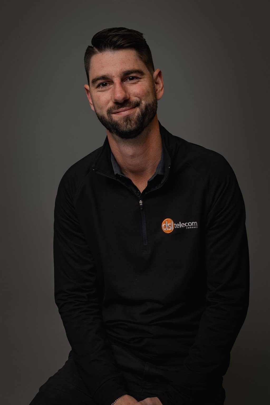 Adriaan Dijkstra, Business fibre sales manager at DSL Telecom, shown in a formal business setting.