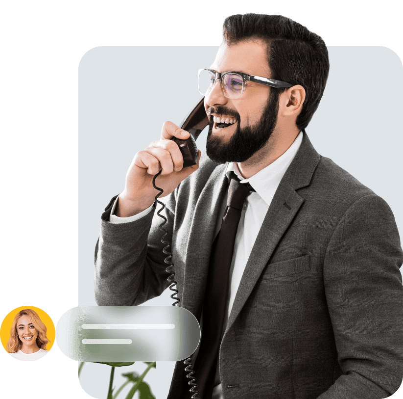 A man talking on a Yealink IP phone