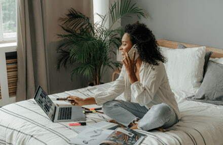 Woman working from home and making a call using Vox’s 60-minute free voice calling service
