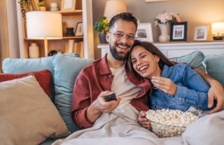 Couple streaming movies with Vox Link Africa’s fast and stable fibre internet connection in South Africa