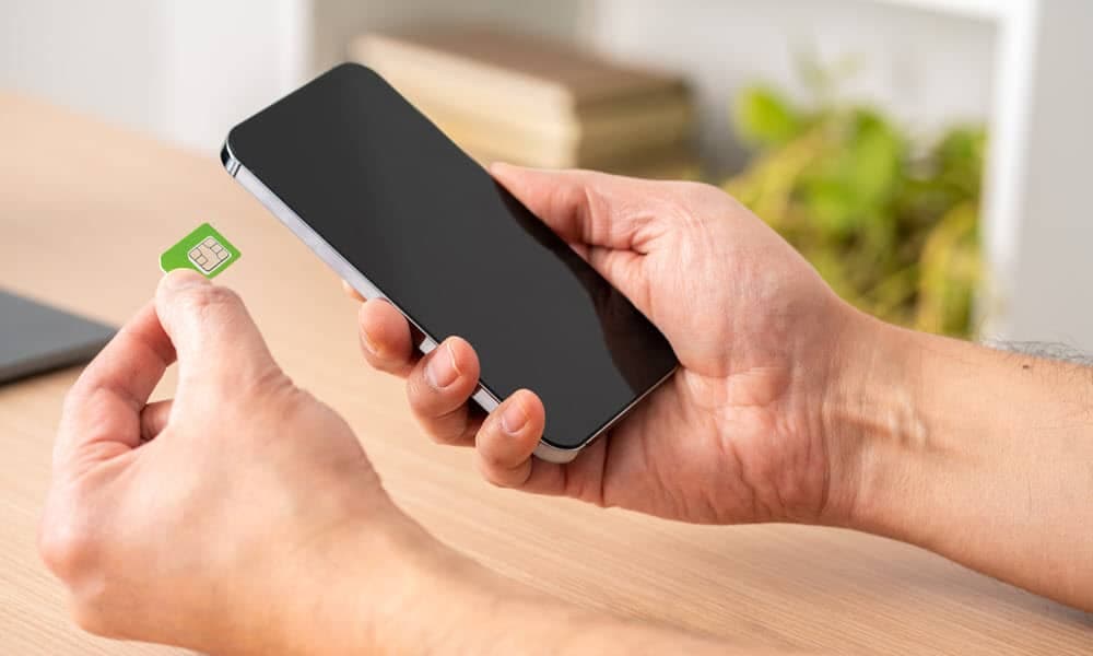 Telkom LTE SIM card and smartphone representing hassle-free plug-and-play mobile data internet in South Africa.